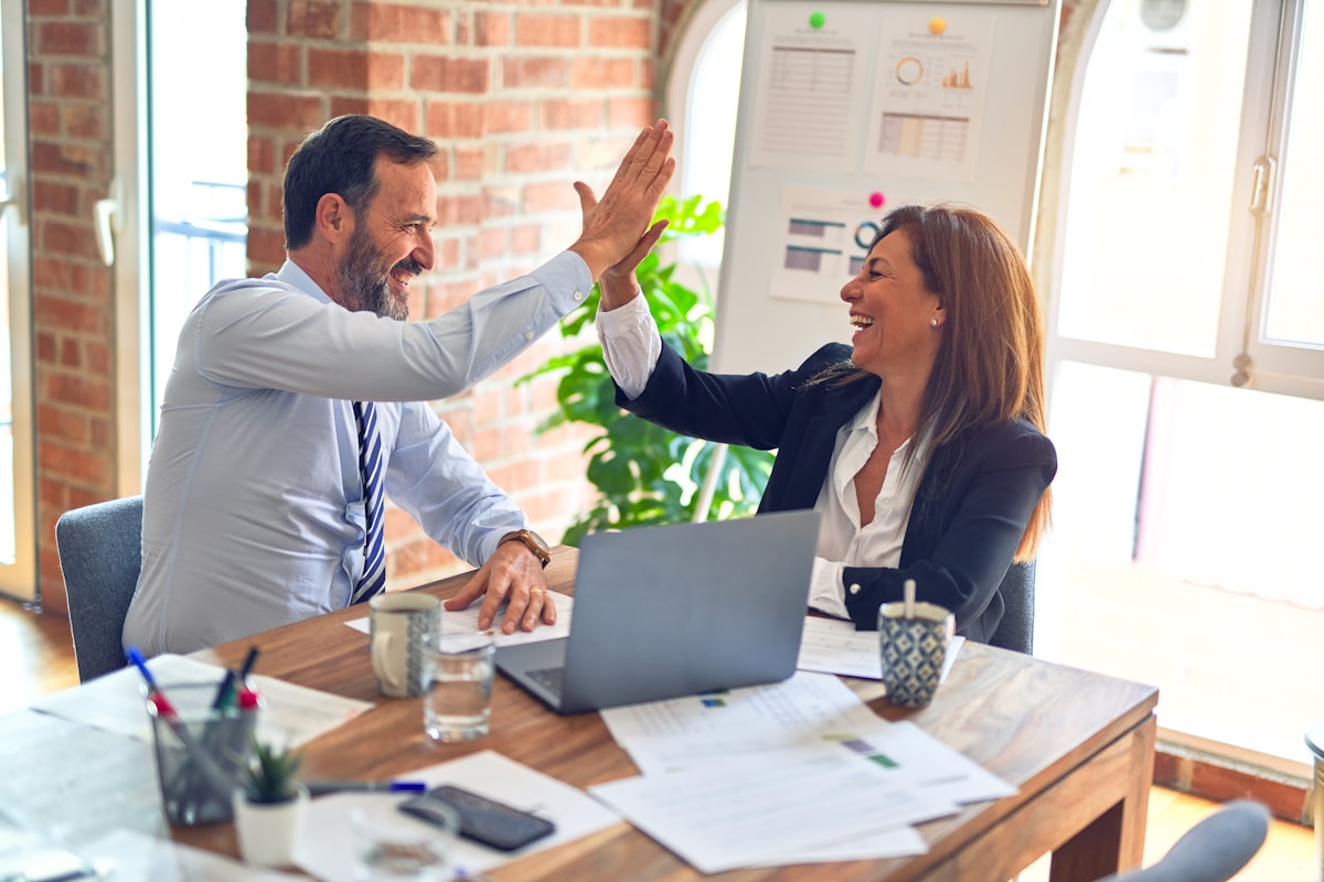 Two advisors in conversation with a client